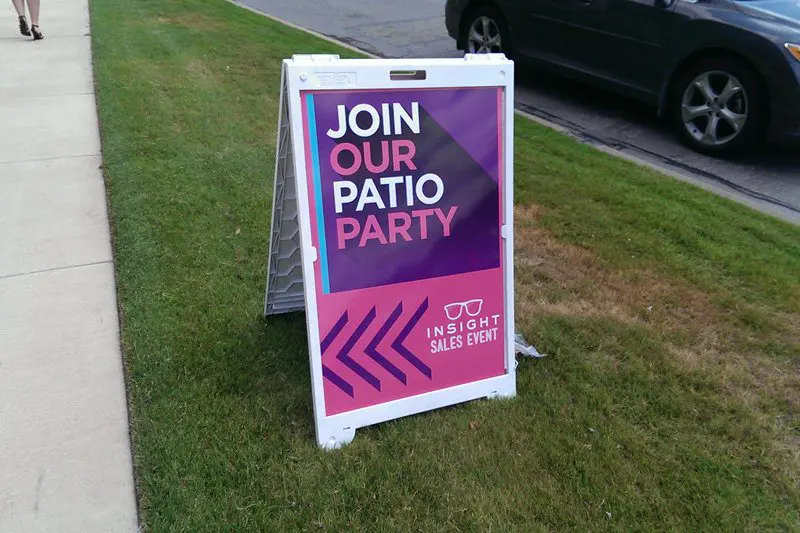 A sign that says join our patio party