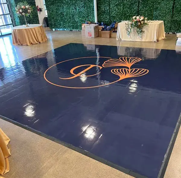 A large floor with a blue and orange logo